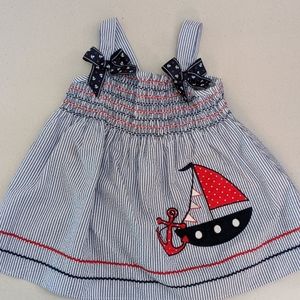 Smocked applique sailboat dress